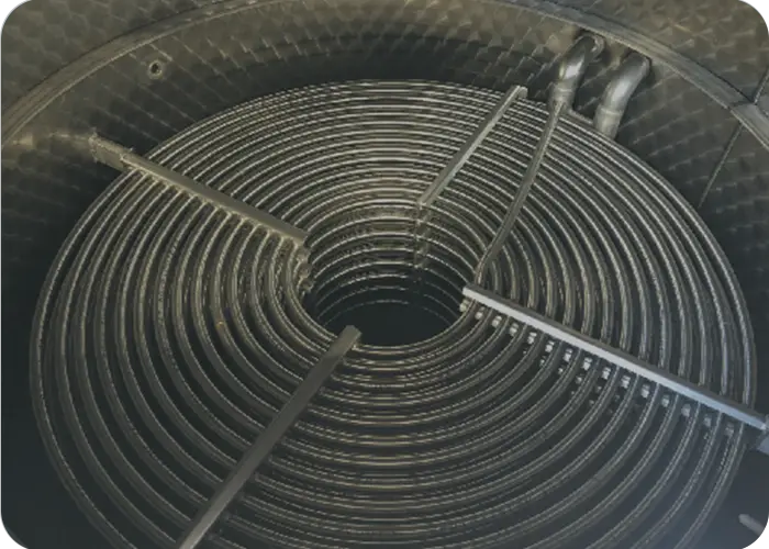 Serpentin interne d'un évaporateur d'eau Tricolor Industries pour industrie textile